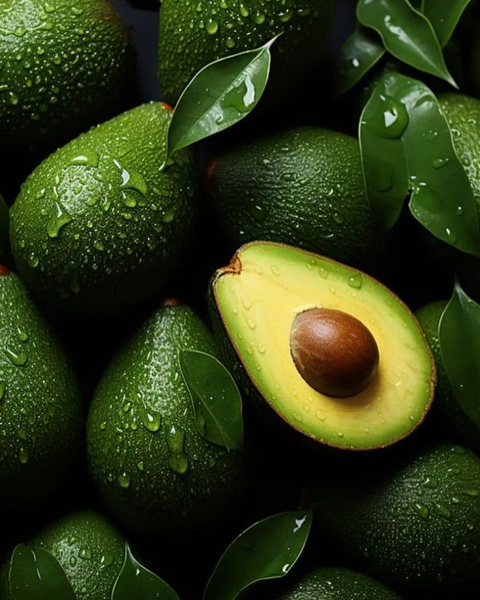 A vibrant green avocado, showcasing its smooth skin and seed, symbolizing freshness and health in fruit form.