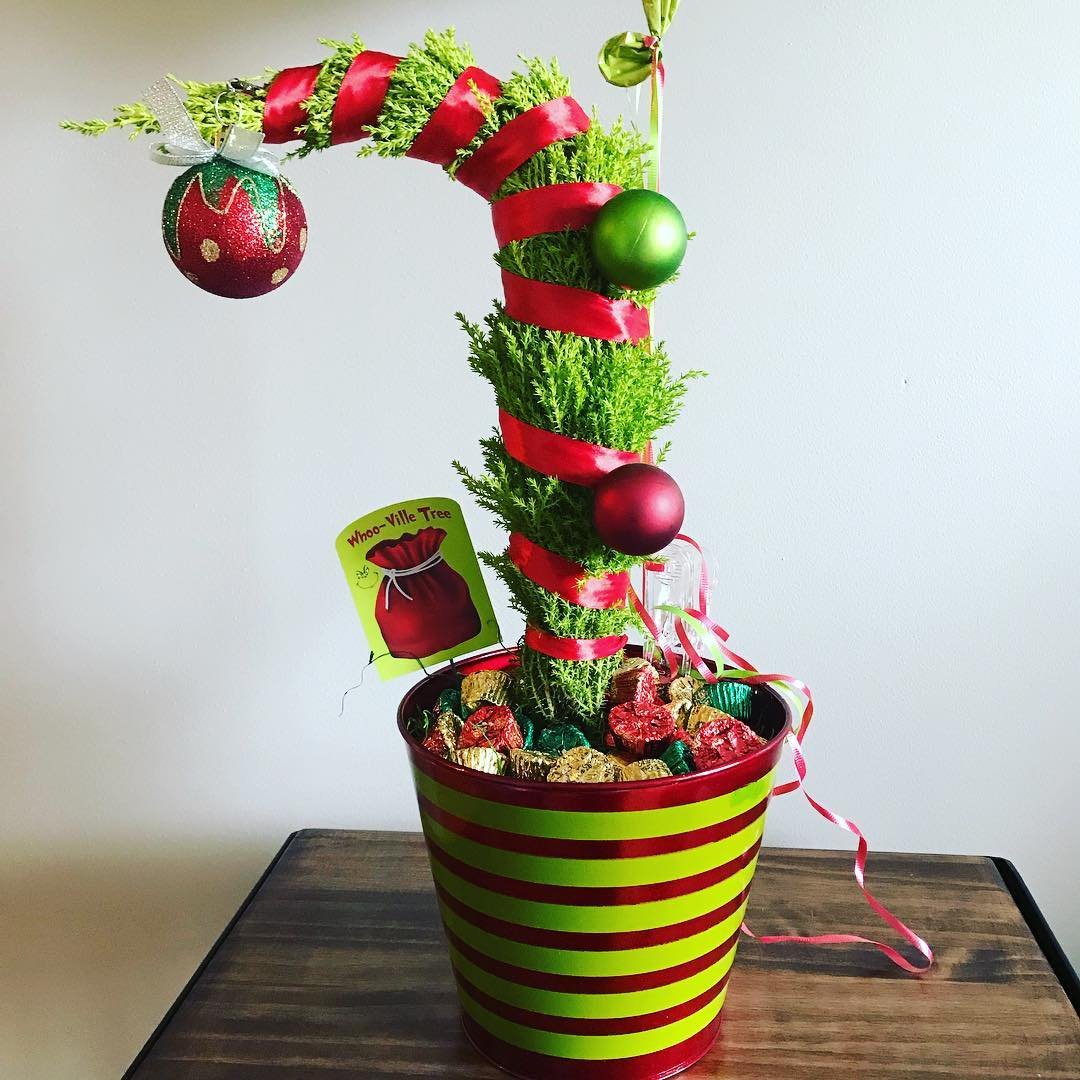 A potted Christmas tree adorned with ornaments and candy, Whoville style.