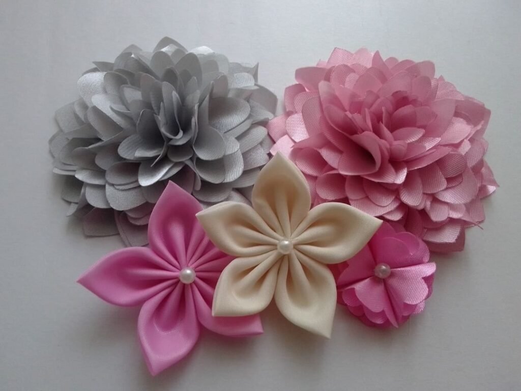 Fabric flowers are artificial blooms made from various textiles, such as cotton or polyester, offering a soft, customizable look for decorations and accessories.