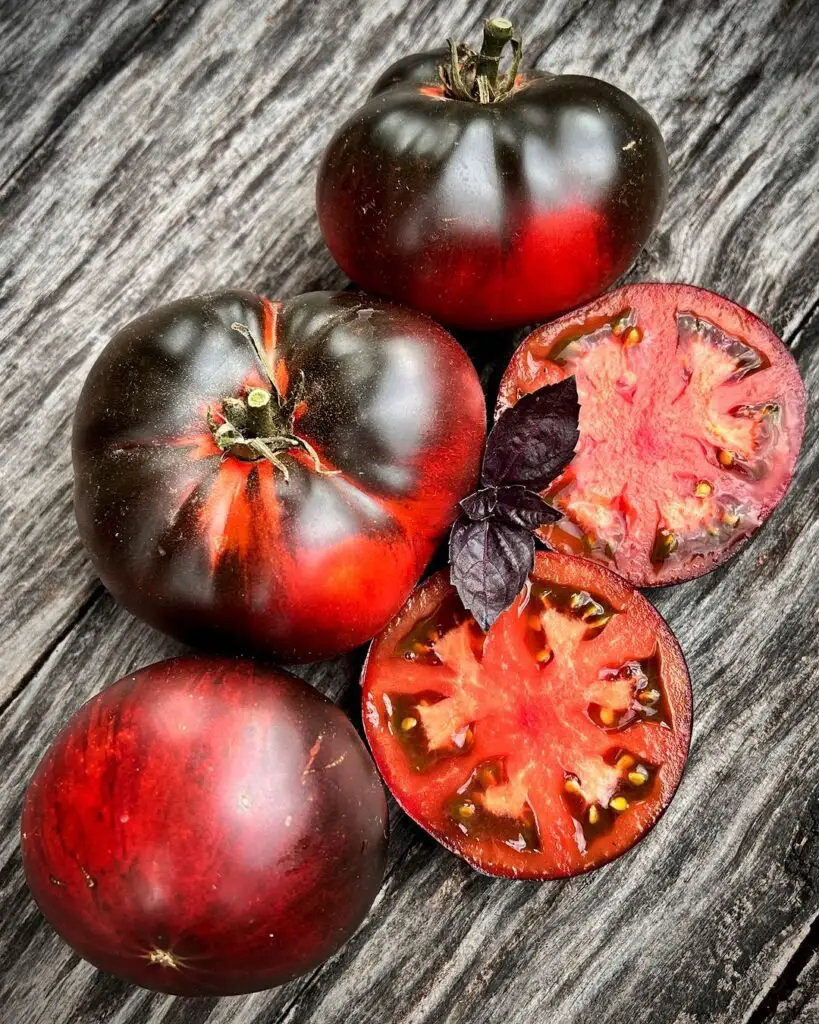 Black Krim is a distinctive heirloom tomato variety known for its dark reddish-brown color, rich and slightly smoky flavor, and juicy texture, thriving in full sun and well-draining soil.